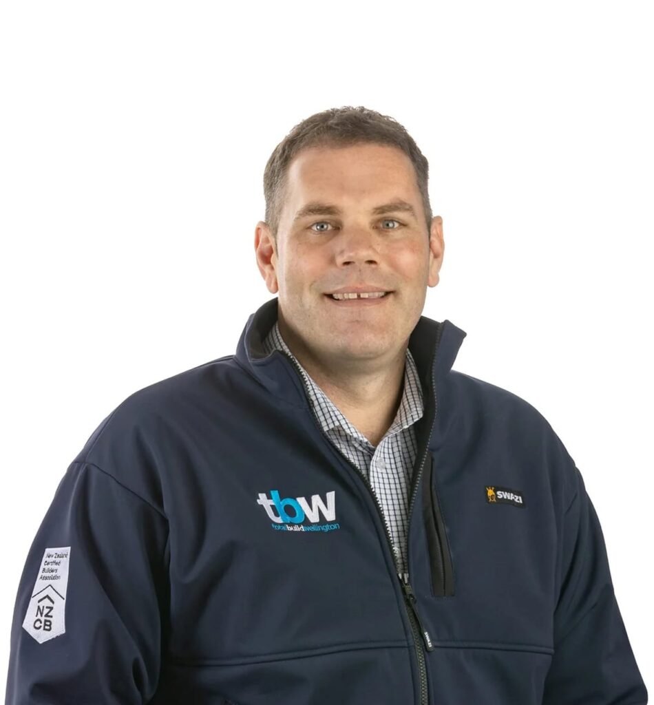 A senior team member in branded outerwear representing a trusted home builder offering project managment, architectural builds, and guidance to build a new home or build a home in developments like Maymorn Farms or Plimmerton Farm.